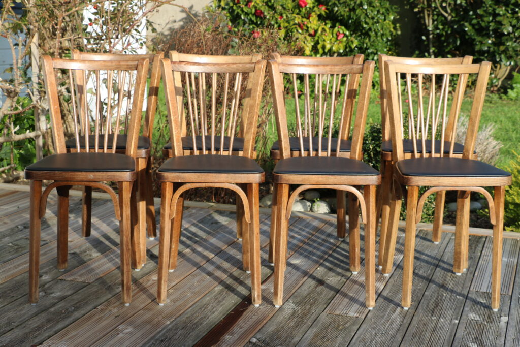 8 chaises BAUMANN N°12 skaï noir hêtre foncé