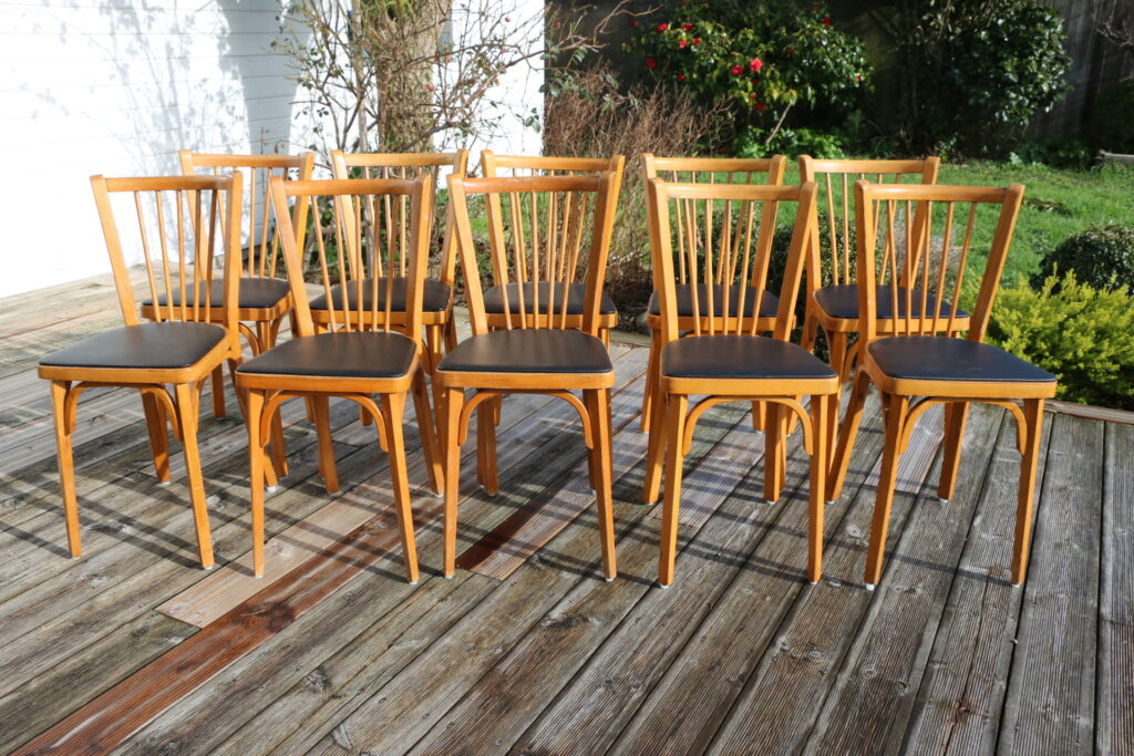 10 chaises BAUMANN N°12 skaï noir hêtre clair