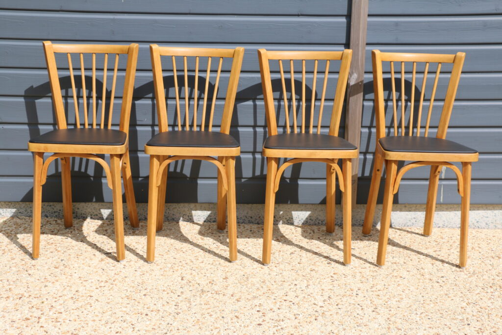 4 chaises BAUMANN N°12 skaï noir hêtre clair